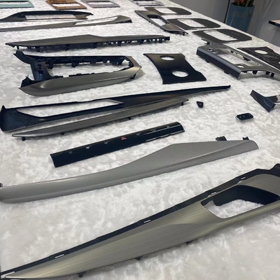 Un fabricante profesional de personalización de piezas de plástico en proceso de decoración de moldes (IMD) de China